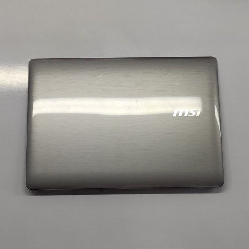 photo_2025-07-22_19-32-47 قاب پشت ال سی دی لپ تاپ ام اس ای MSI MS-16Y1 طوسی-استوک - Image 1